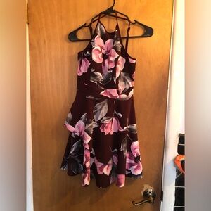 Wrap around back beautiful floral print.burgundy color.